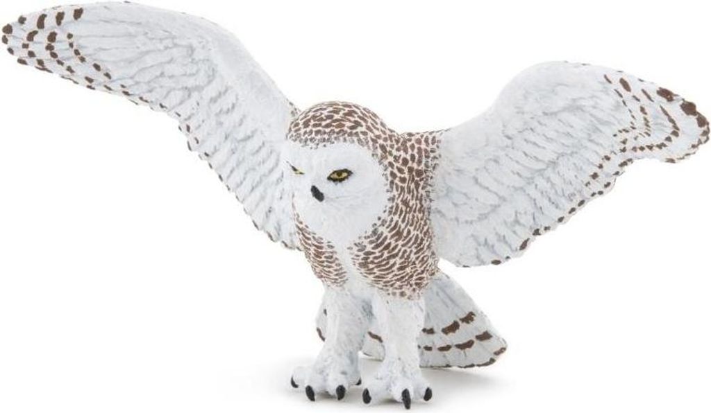 A toy snowy owl figurine in flight against a white background.