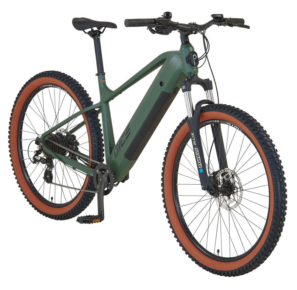 A green electric mountain bike with bronze tires is shown against a white background.