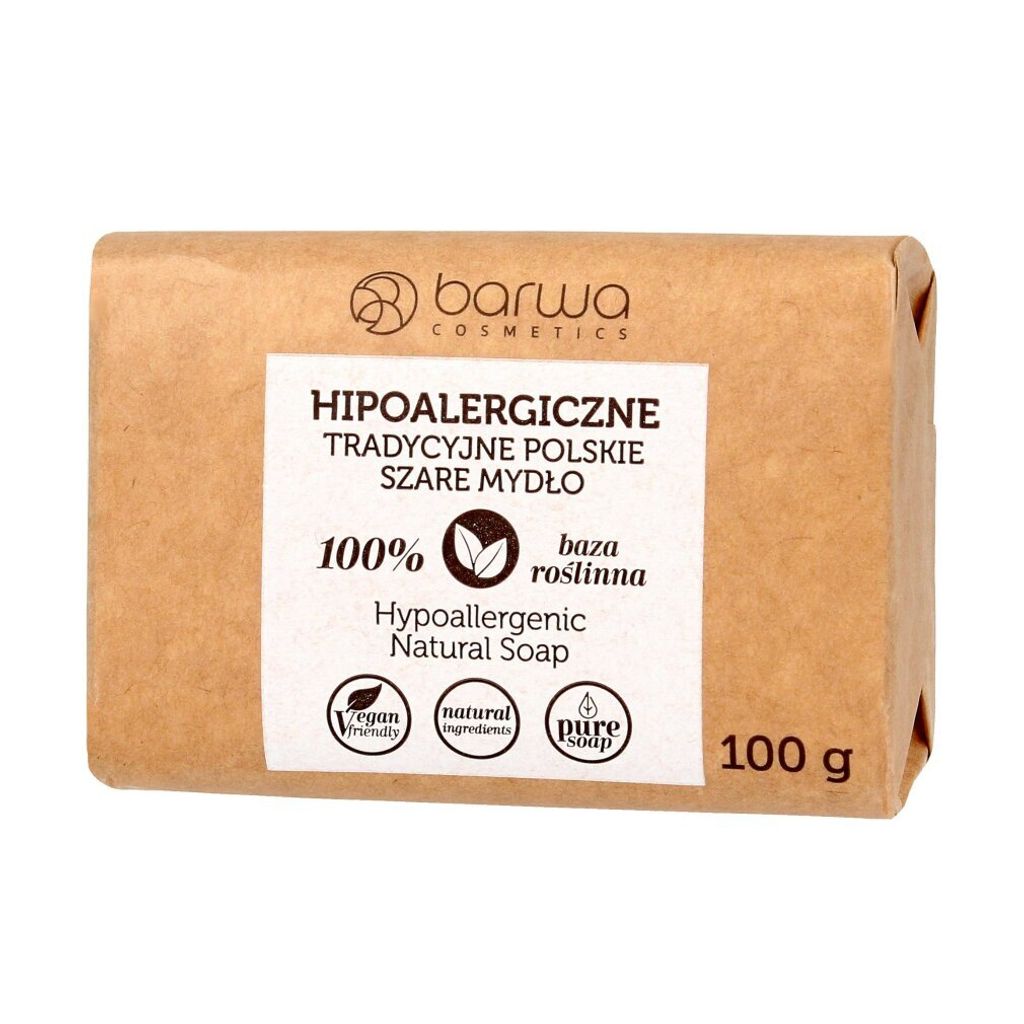 A bar of soap wrapped in brown paper packaging, with text and icons on the front.