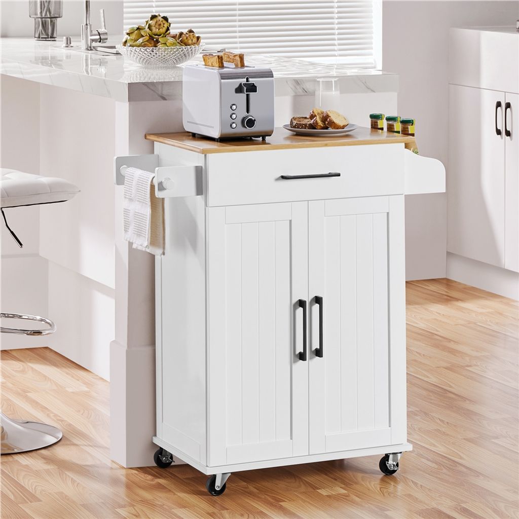 A white kitchen cart with a wooden top is shown in a kitchen setting next to a counter and a stool.