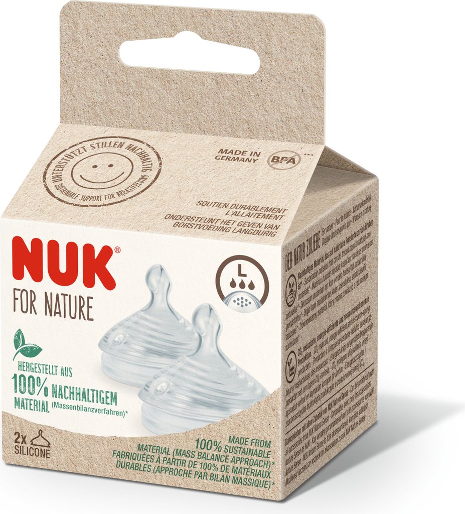 A product box containing two NUK For Nature silicone pacifier nipples.