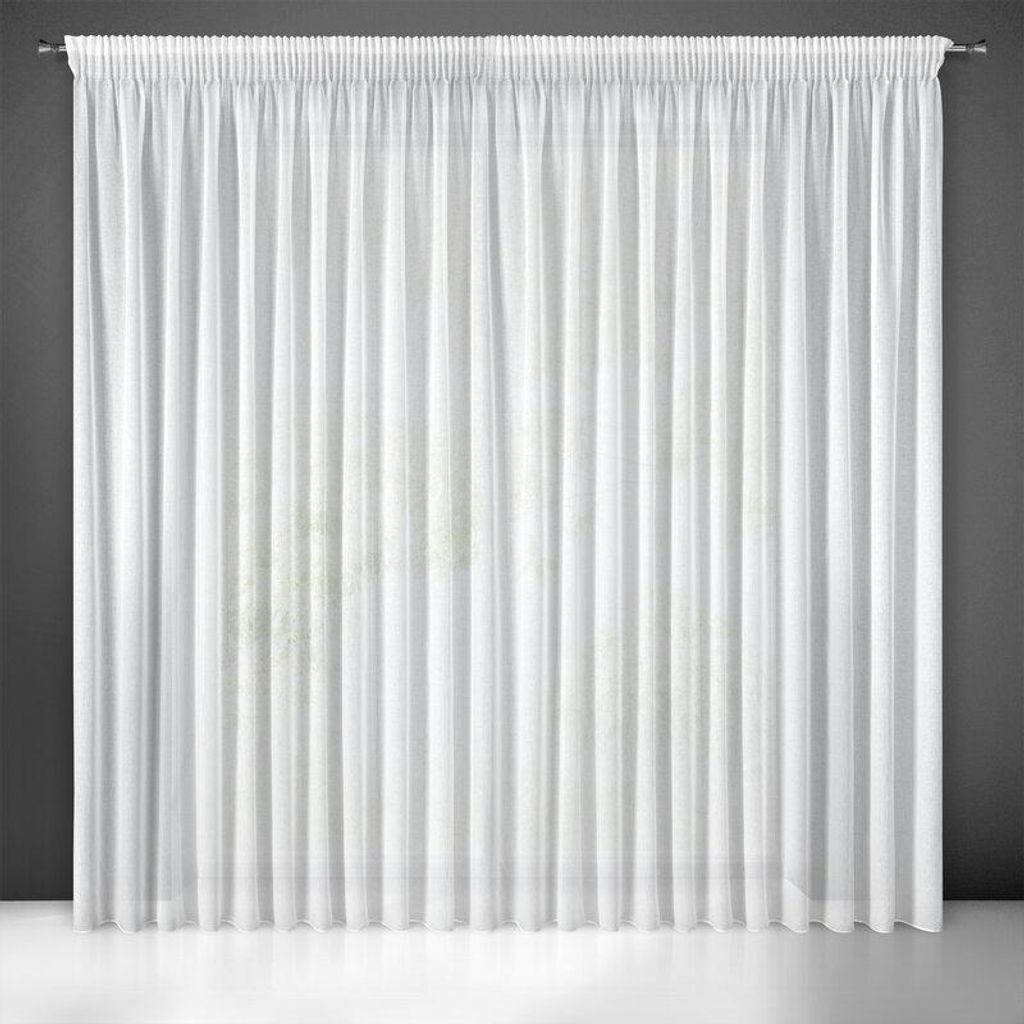 A white sheer curtain hanging against a dark gray wall.