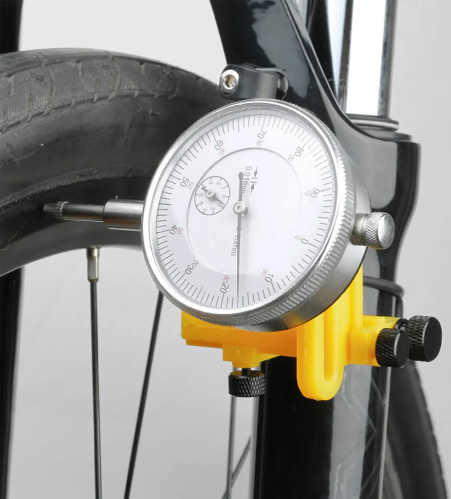 Table de pourcentage pour réglage de jante et dévoilage de vélo