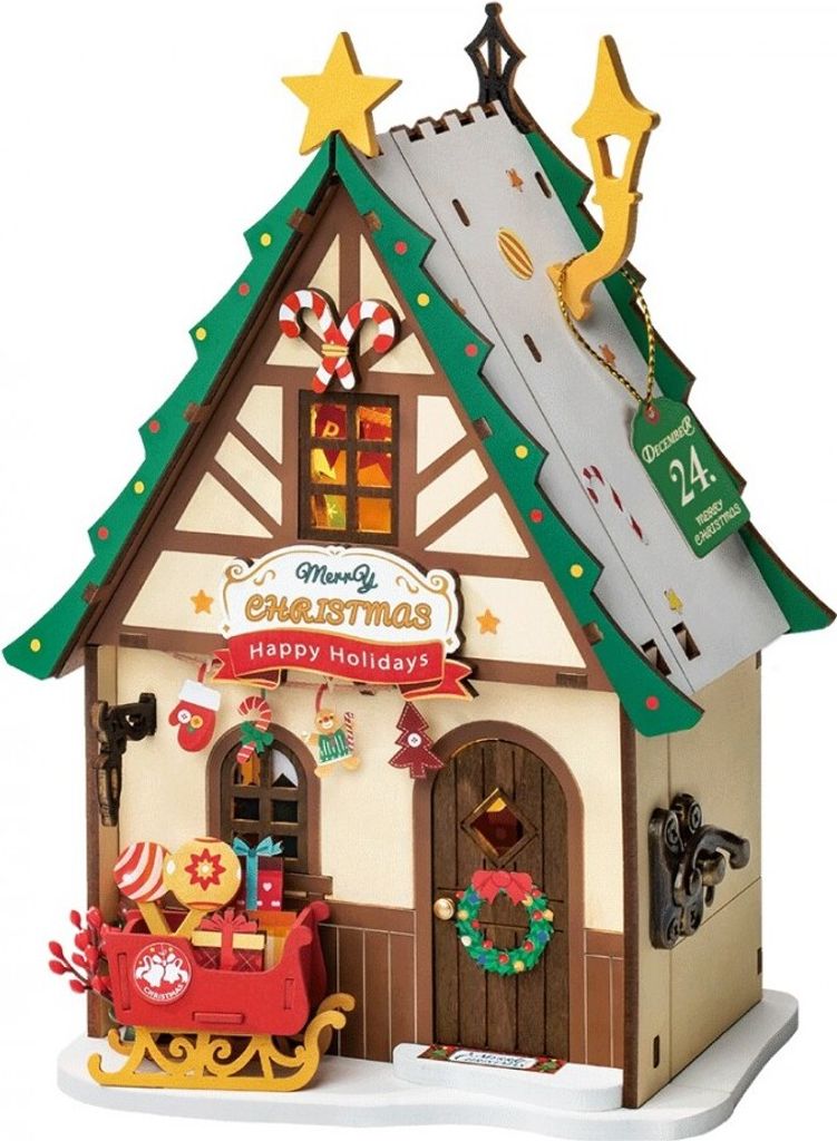 A festive, miniature Christmas house decorated with holiday elements.