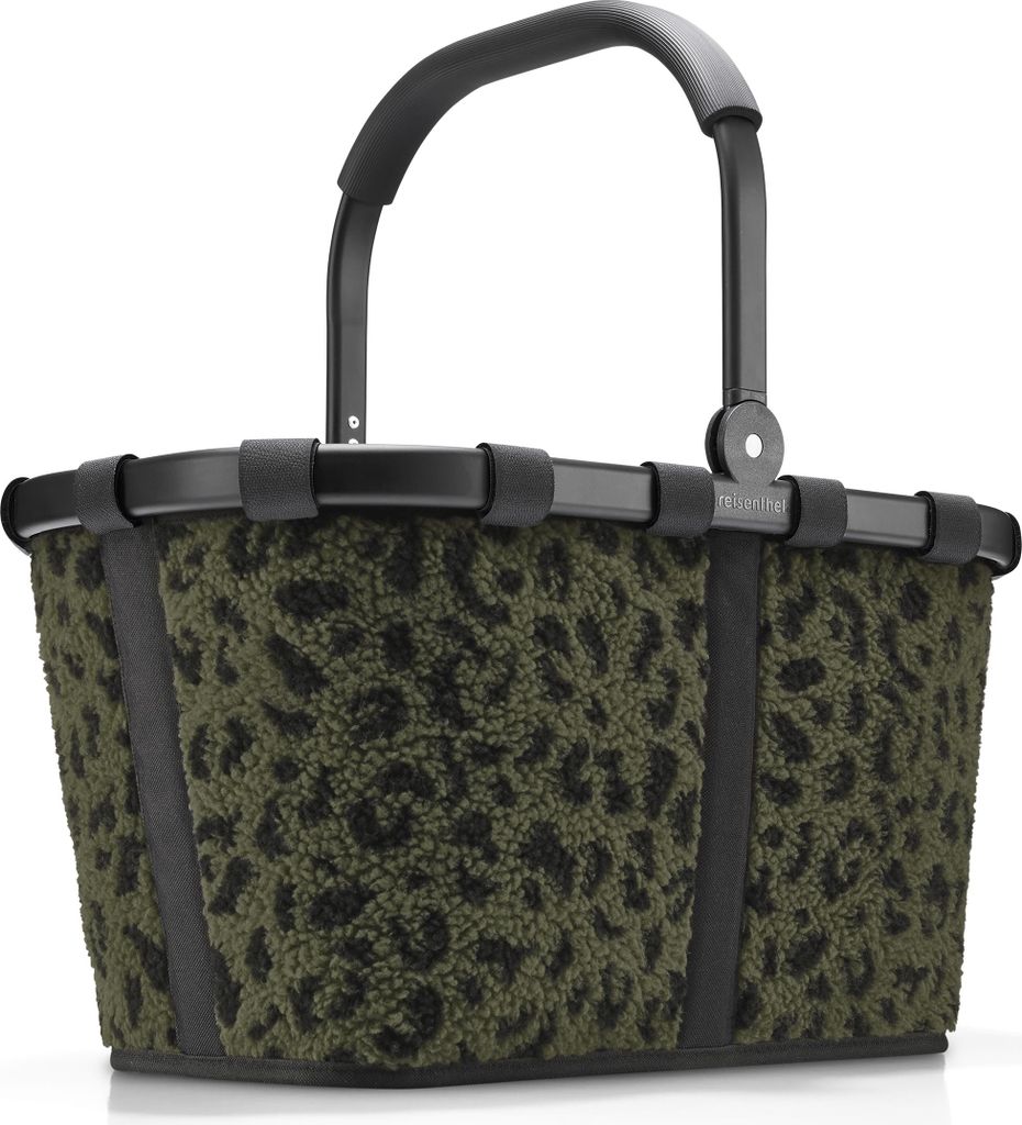 A studio shot of a shopping basket with a leopard print pattern.