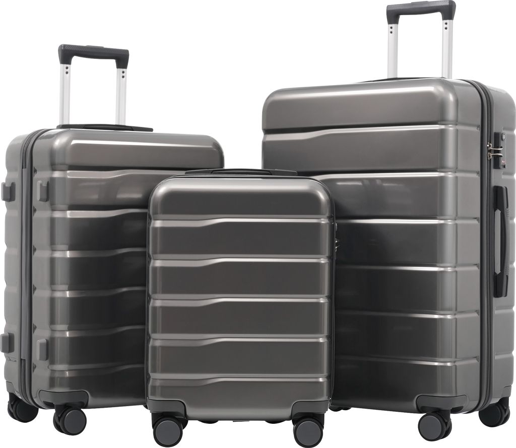 Three gray suitcases of different sizes are arranged diagonally on a white background.
