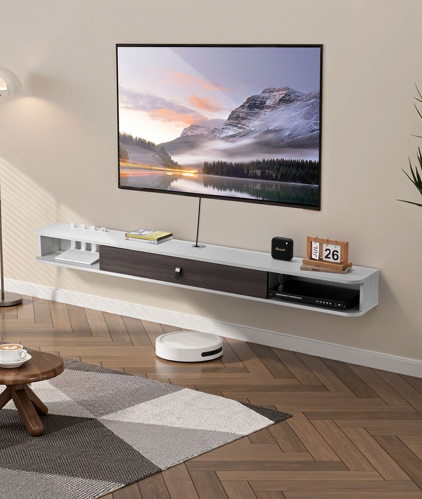 A modern living room with a wall-mounted TV cabinet and a TV.