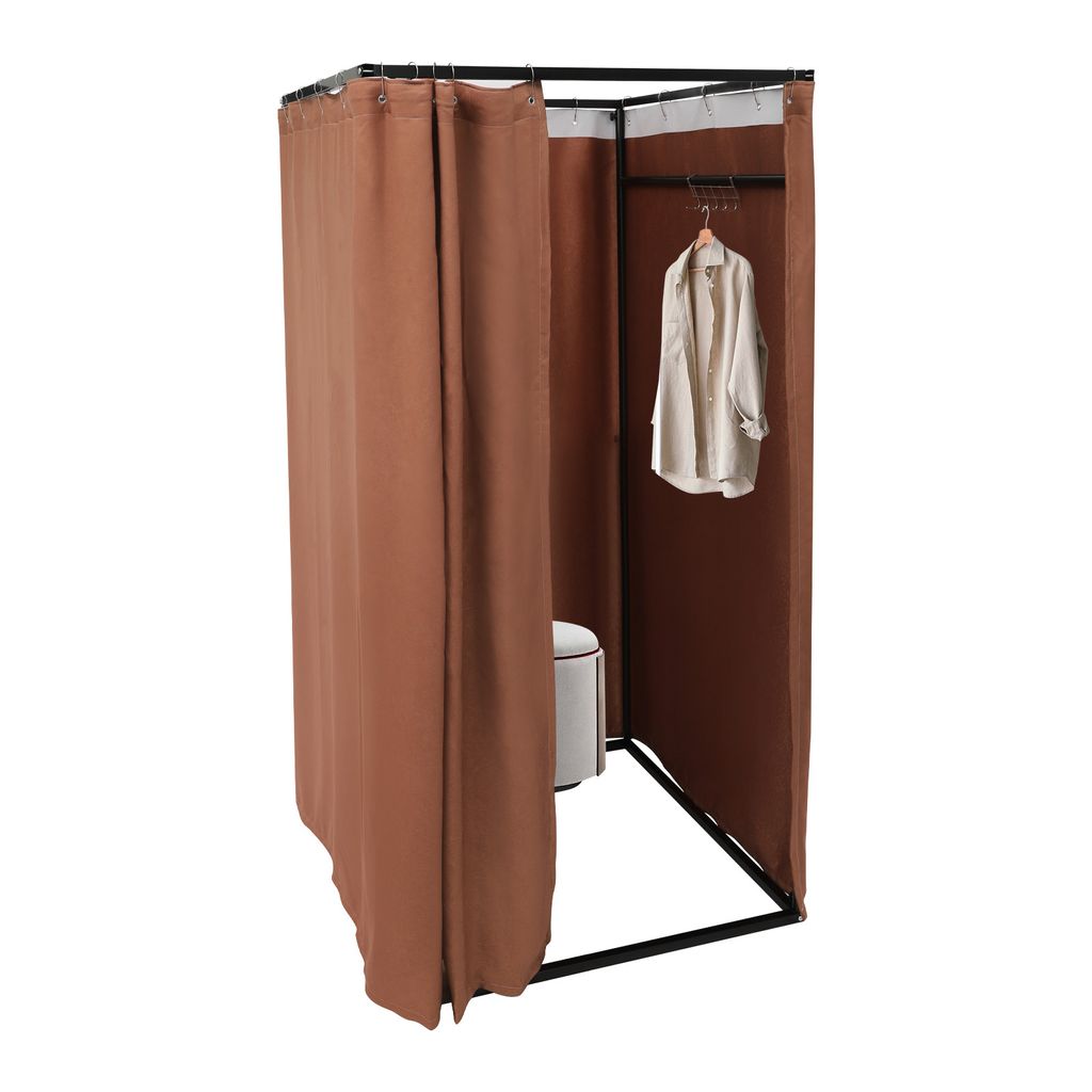 A freestanding changing room with brown curtains and a white stool inside.