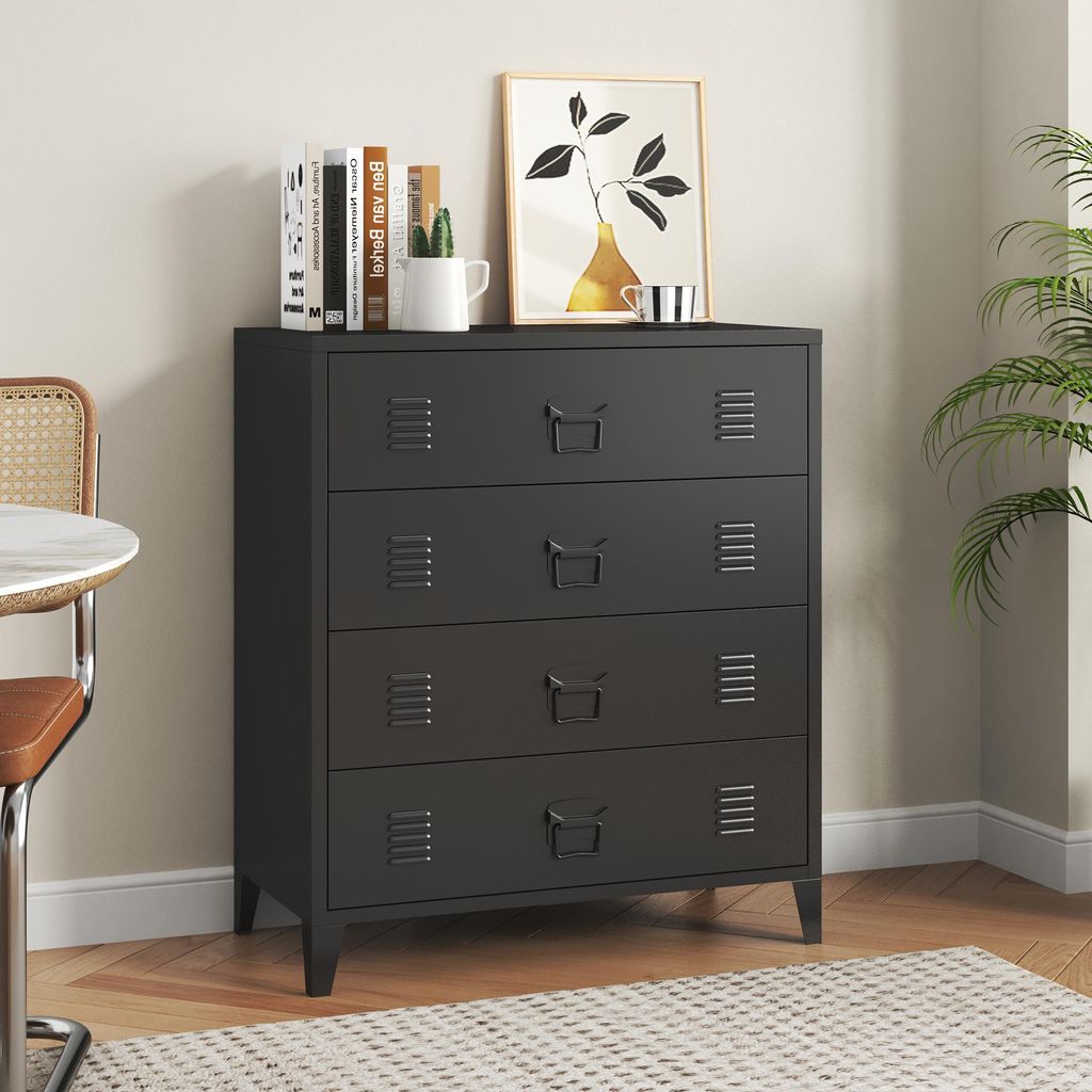 A black metal dresser with four drawers is shown in a room setting.