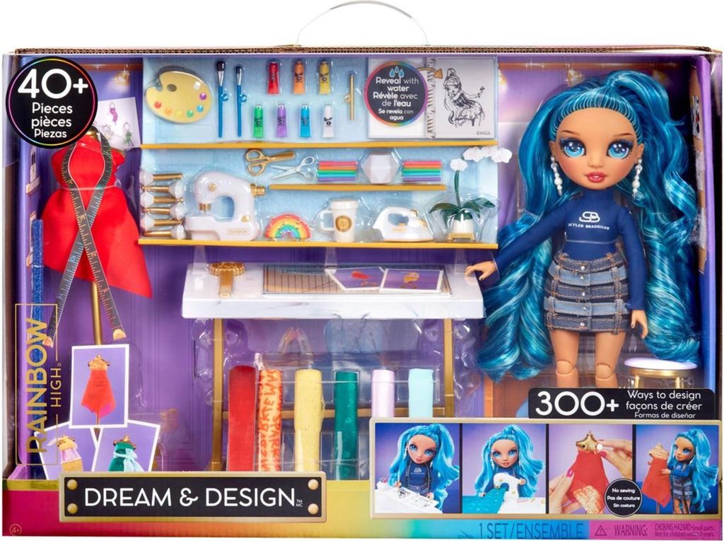 A toy playset featuring a fashion doll and a design studio setup.