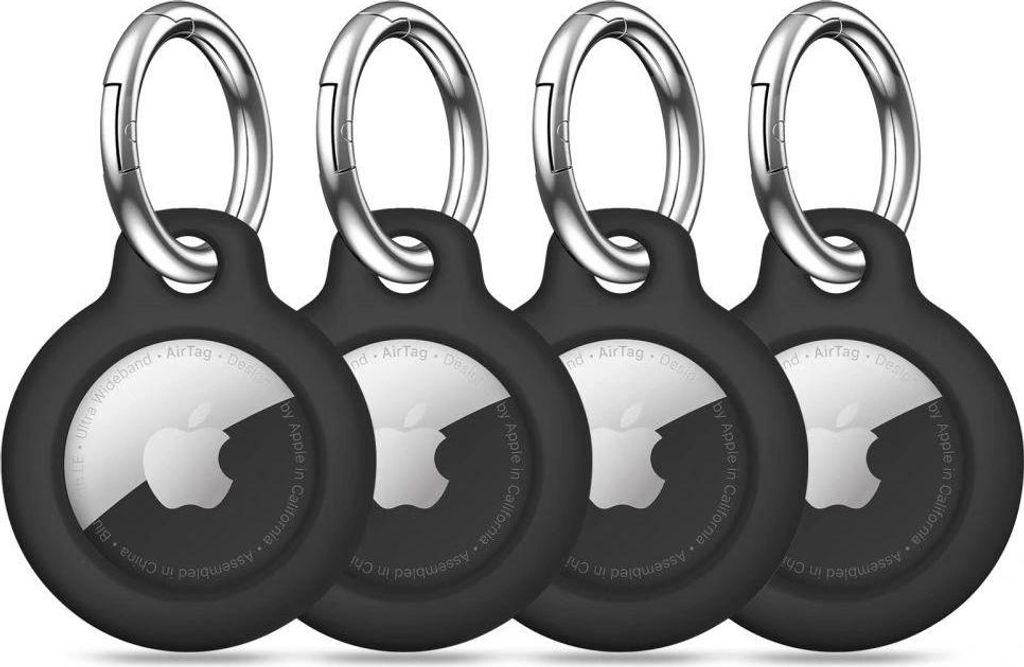 Four black AirTag holders with silver keyrings are arranged in a row against a white background.