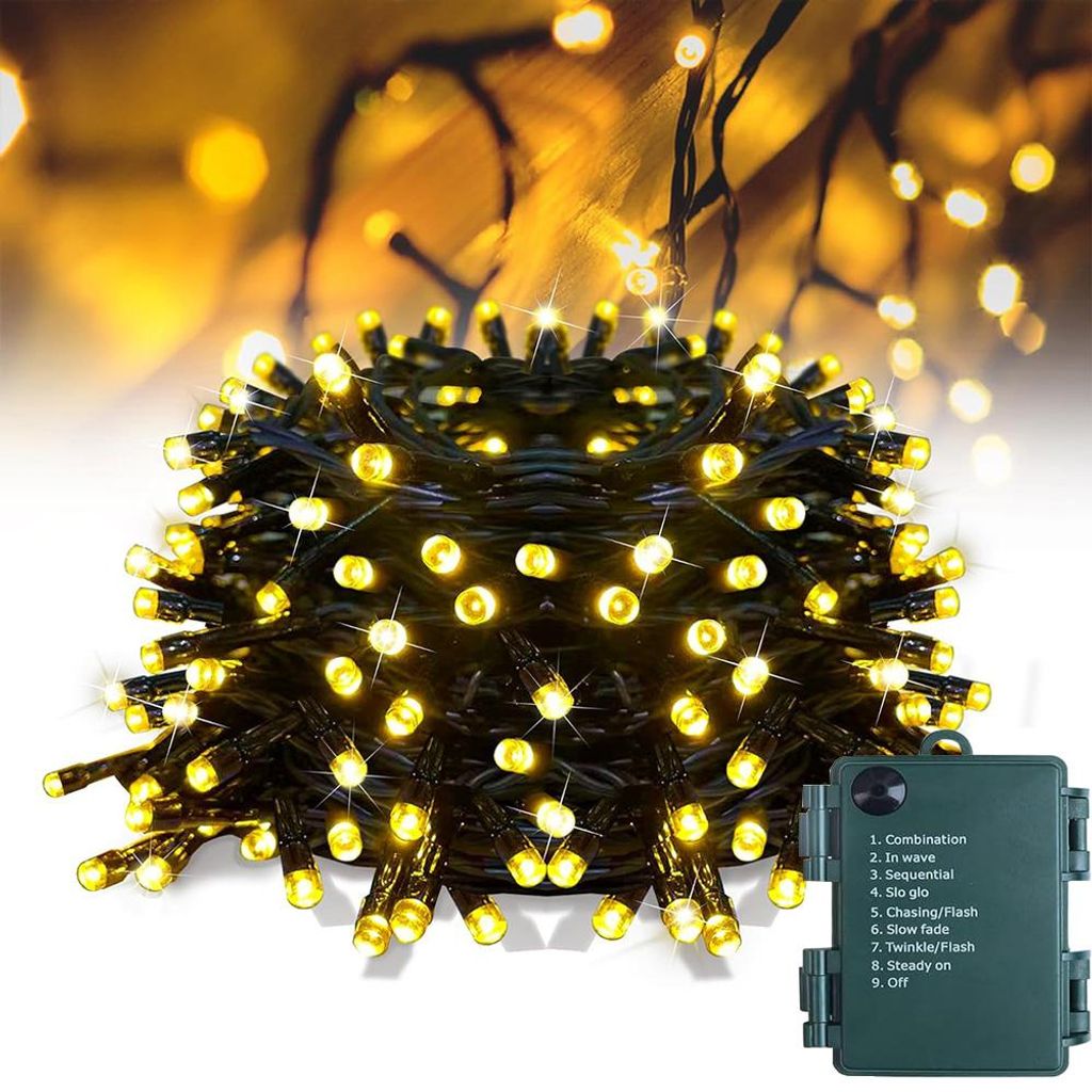 A coiled string of warm white LED lights with a green battery pack.