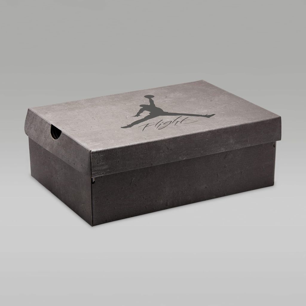 A dark grey shoe box with a grey lid, featuring the Jordan logo and the word "Flight" printed in black.