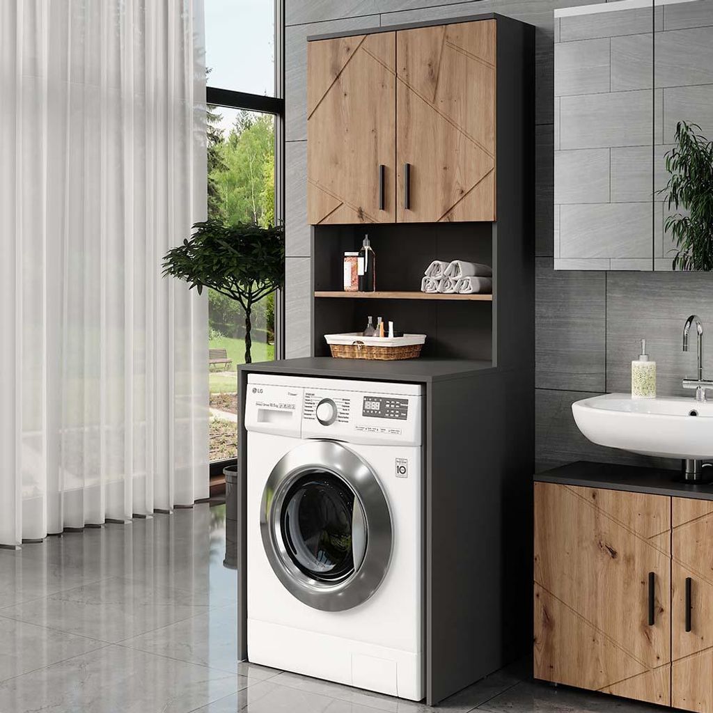 A modern laundry room with a washing machine, a cabinet unit, and a sink.