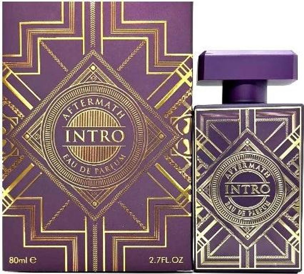 A perfume bottle and its box, both with intricate gold geometric patterns on a purple background.