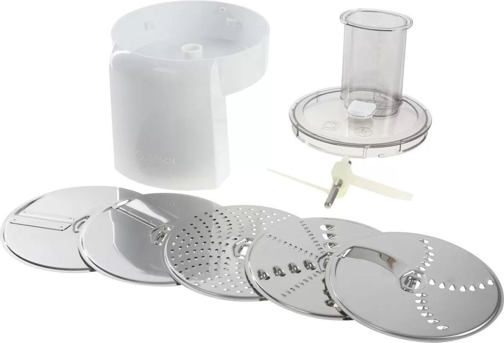 A set of food processor attachments, including various cutting discs and a pusher, laid out on a white background.