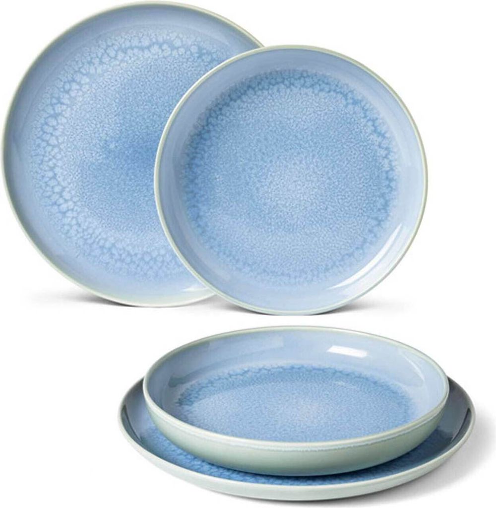 A set of blue ceramic plates and bowls.