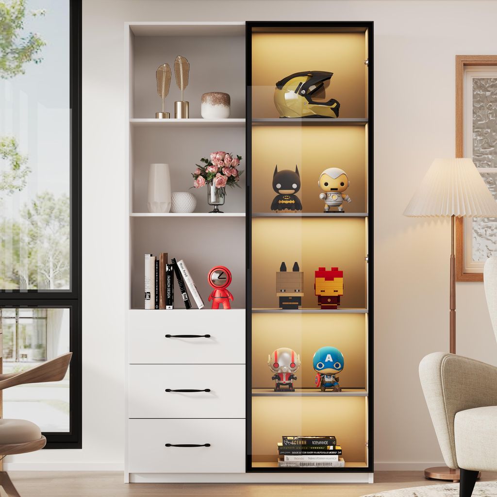 A white cabinet with glass doors and LED lighting, displaying various collectible items and books.
