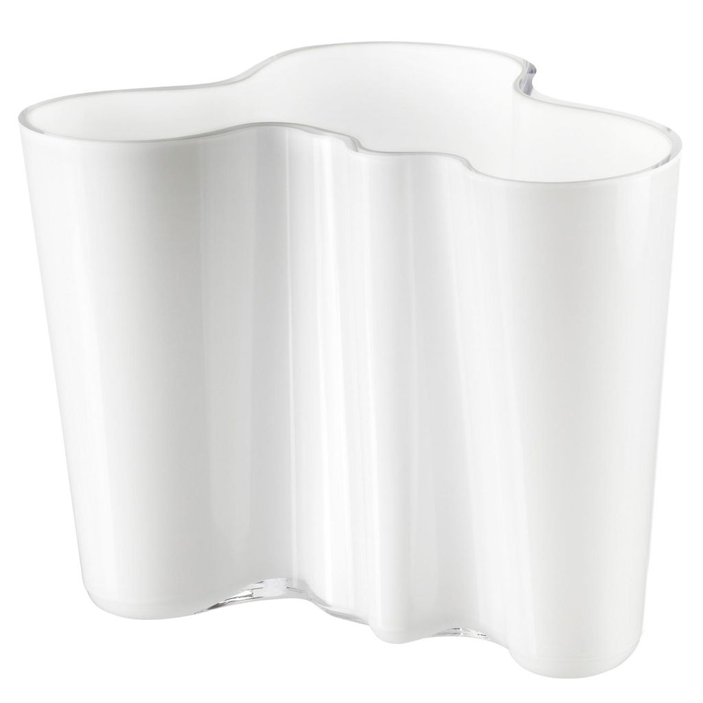 A white vase with a wavy, organic shape.