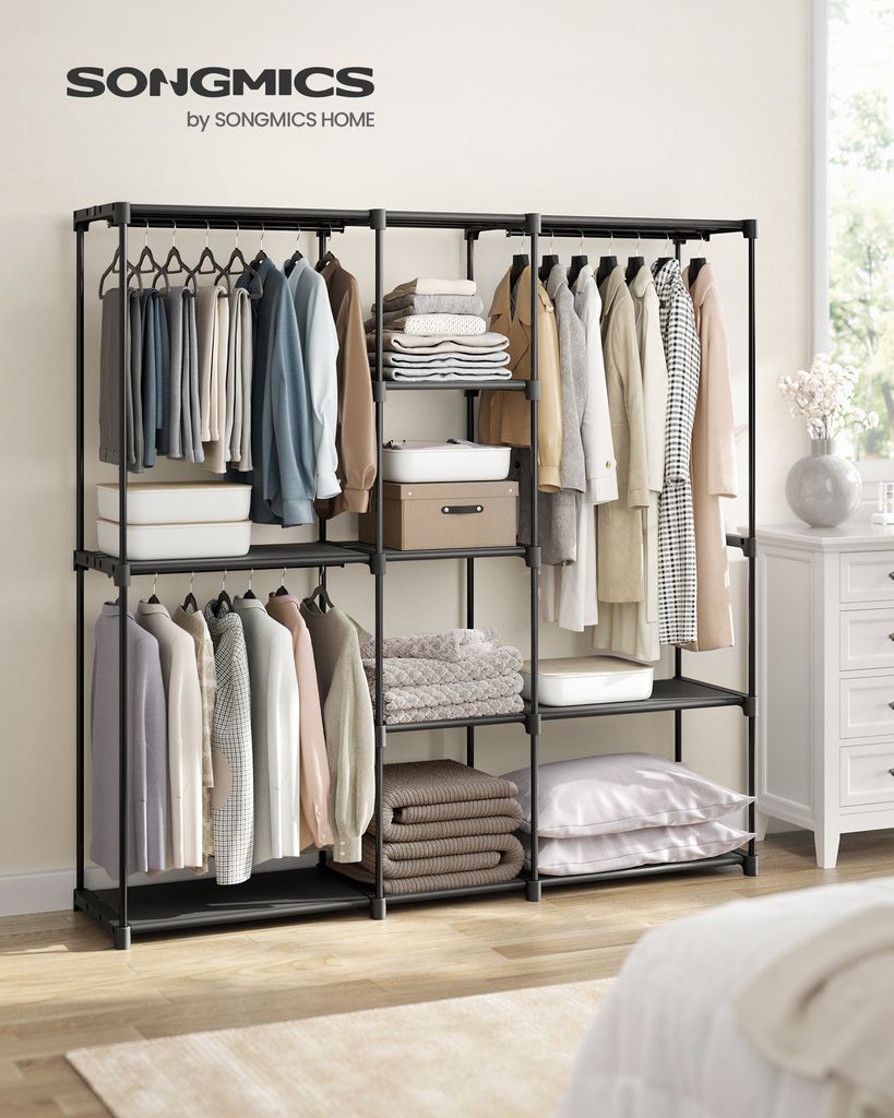 A neatly organized clothing rack with various garments and folded linens.