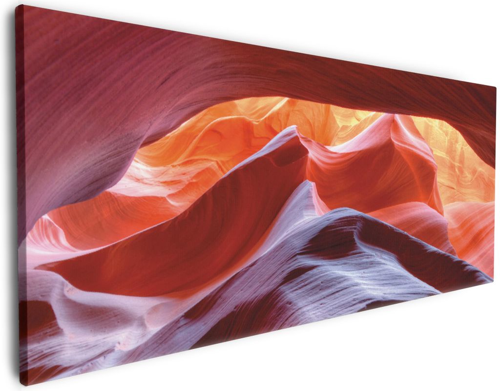 Wallario Premium Leinwandbild Antelop Canyon USA Kalksandsteingebirge in leuchtenden Farben in Größe 50 x 125 cm
