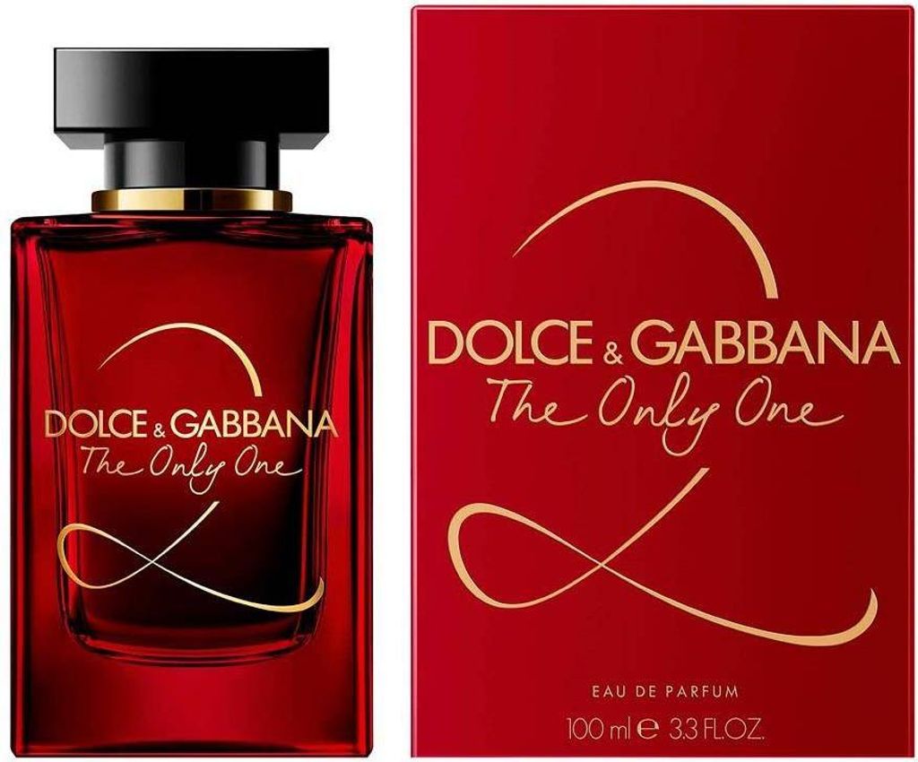 A bottle of Dolce & Gabbana The Only One 2 perfume and its matching red box, both featuring gold lettering and decorative swirls.