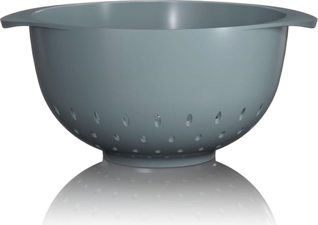 A grey colander is shown on a white background with a reflection.