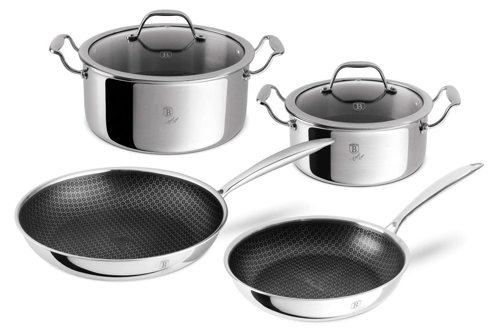 A set of stainless steel pots and pans with glass lids, arranged on a white background.
