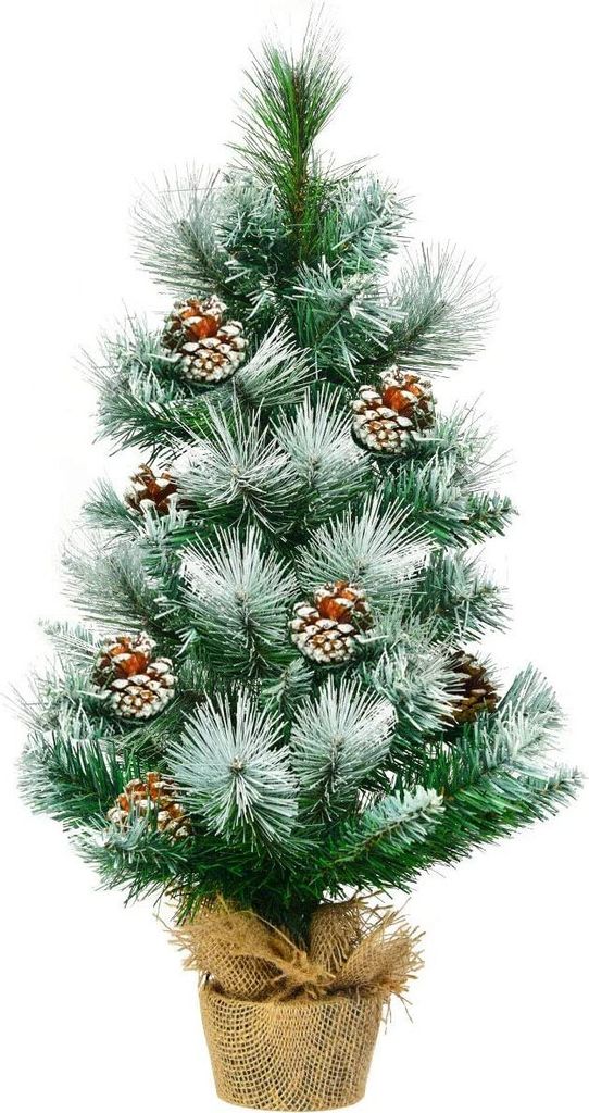 A small, artificial Christmas tree decorated with pinecones and artificial snow, standing in a burlap pot.