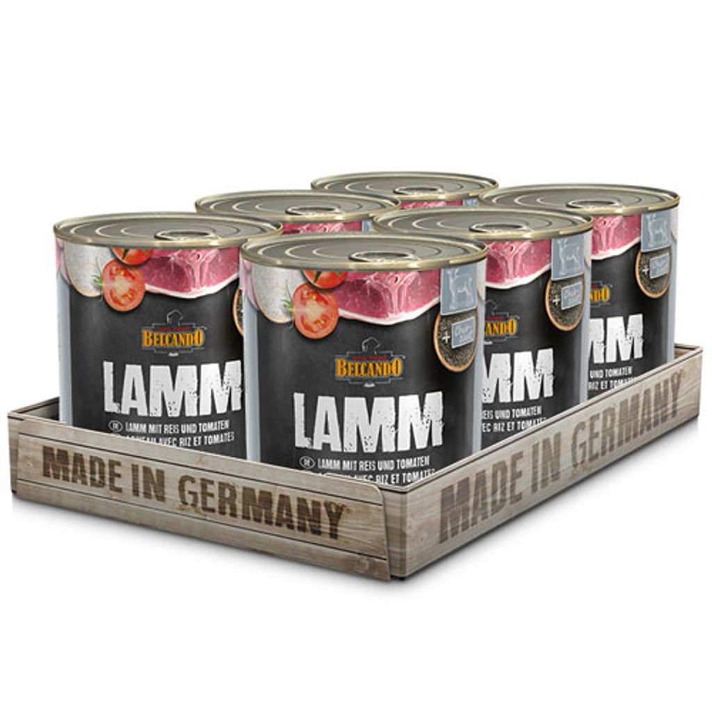 A wooden crate containing six cans of dog food.