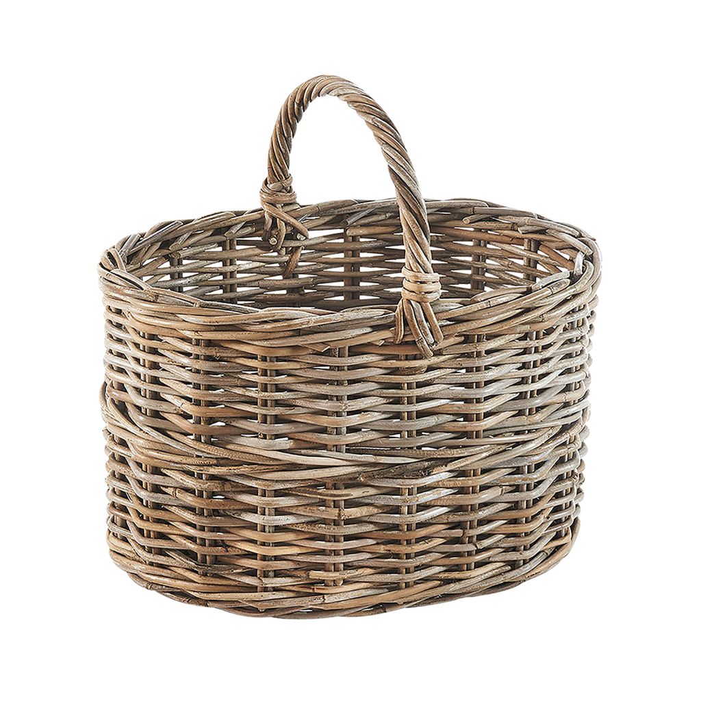 A woven rattan basket with a handle is shown against a white background.