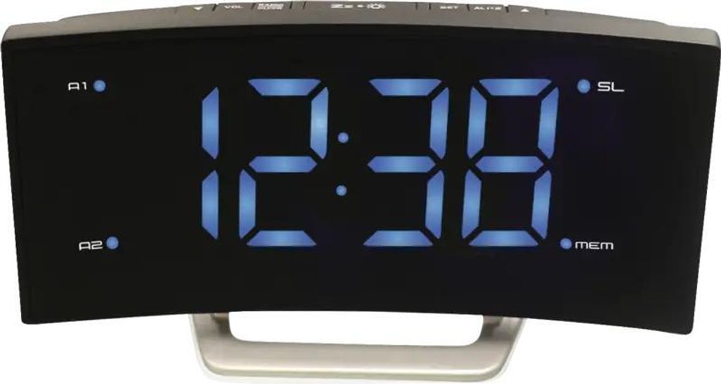 A digital alarm clock with a curved black display showing the time 12:38 in blue LED digits. It has a silver stand.