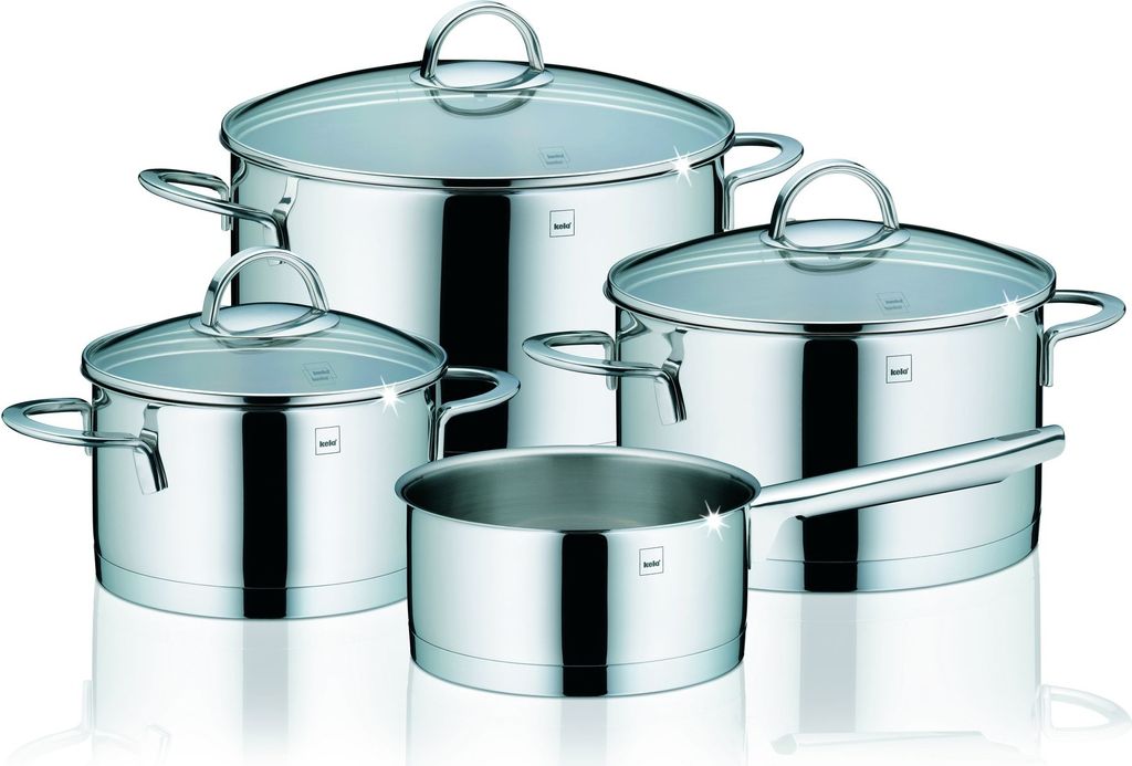 A set of four stainless steel pots with glass lids, arranged on a white background.