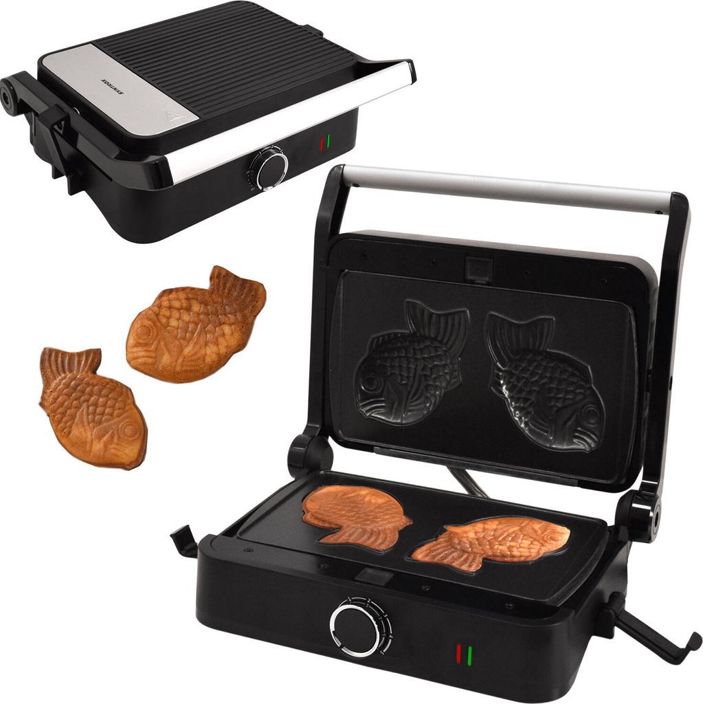 A taiyaki maker with two finished taiyaki pastries.