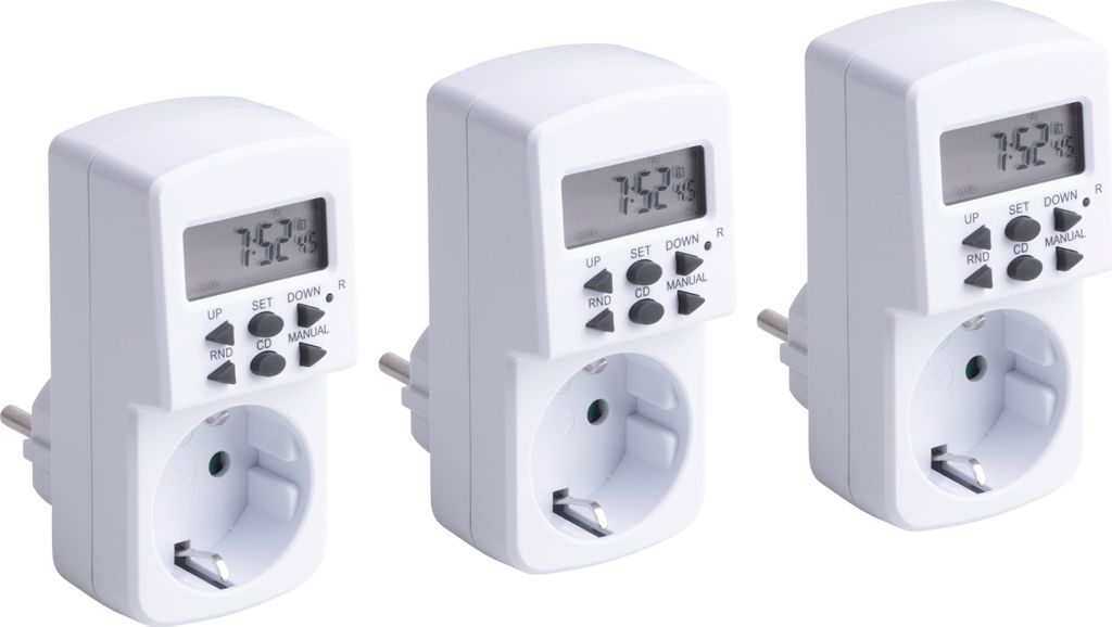 Three white digital timers with electrical outlets are arranged diagonally against a white background.