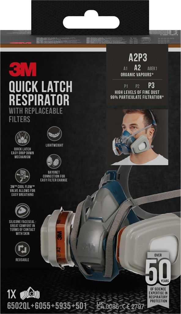 Packaging for a 3M Quick Latch Respirator with replaceable filters, showing a person wearing the respirator.