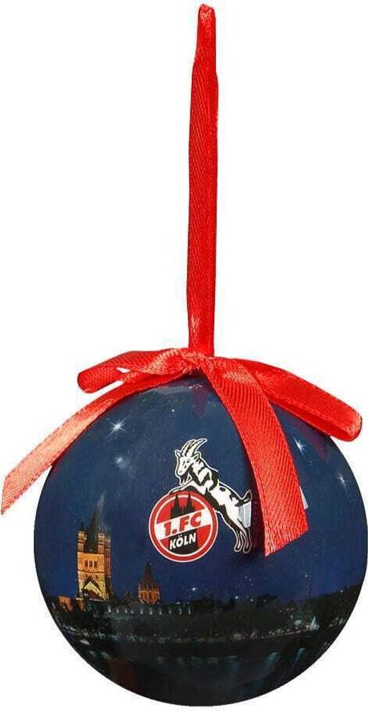 A Christmas ornament shaped like a ball, decorated with a city skyline and a football club logo.