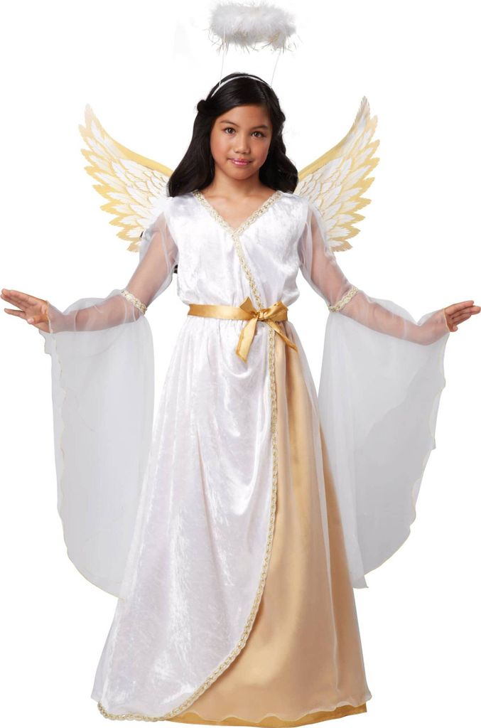 A young girl dressed in an angel costume, complete with wings and a halo, stands against a white background.