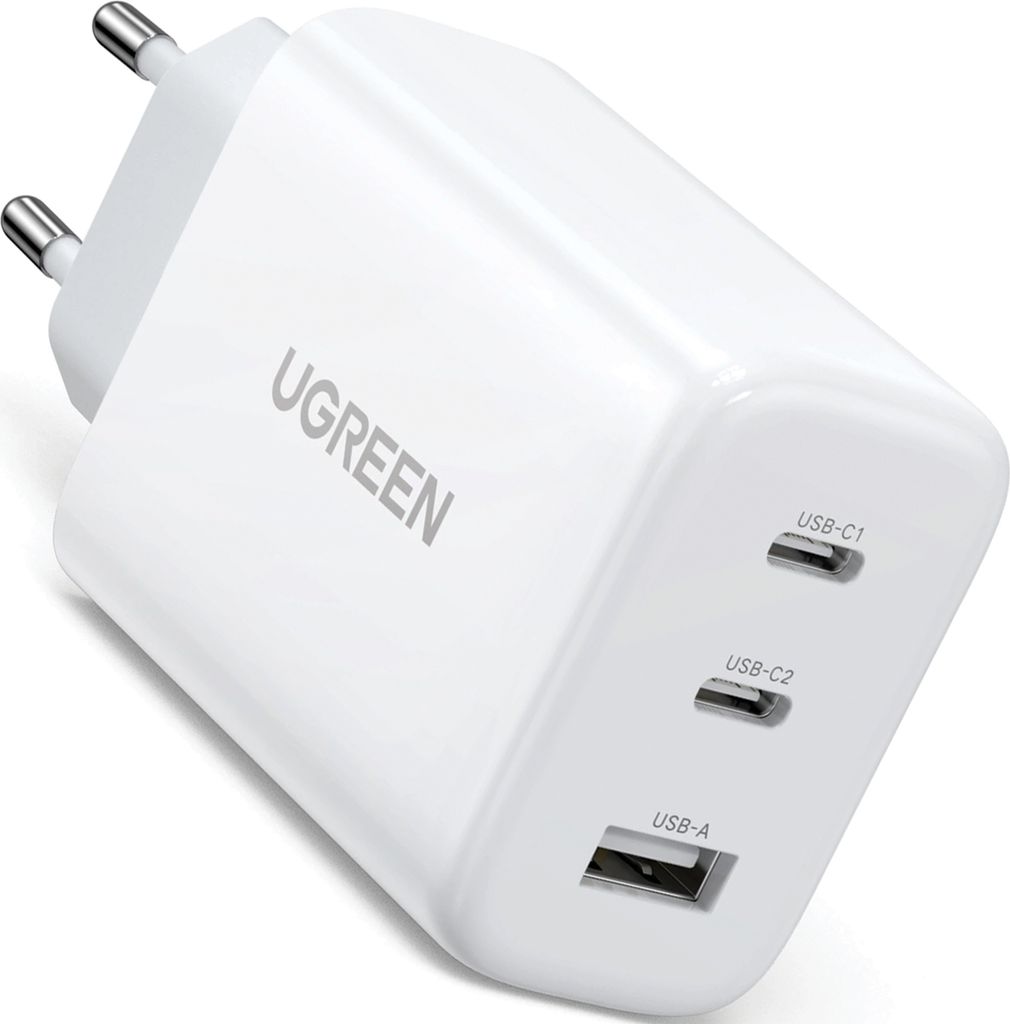 A white Ugreen brand USB charger with multiple ports.