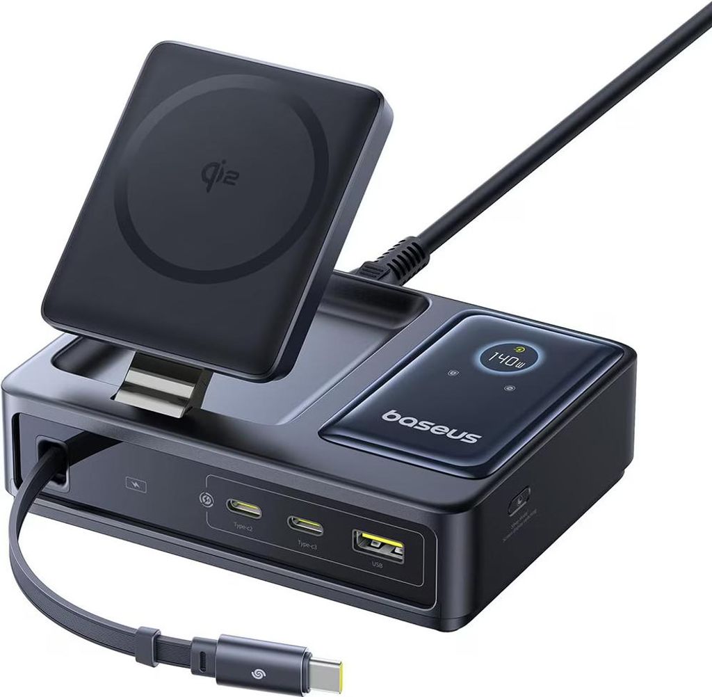 A black multi-functional charging station with a wireless charging pad and multiple ports.