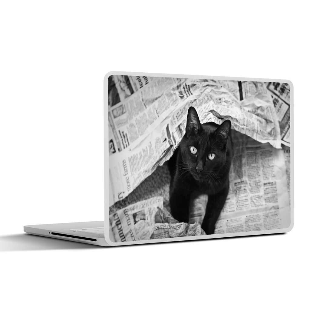 MuchoWow Laptop Aufkleber Sticker Cover Schwarze Katze zwischen den Zeitungen 31x22.5 cm - Laptop-Deko