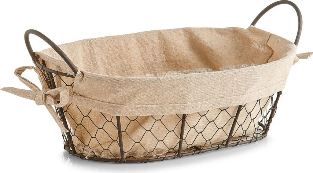 A rustic wire basket with a fabric liner and handles.