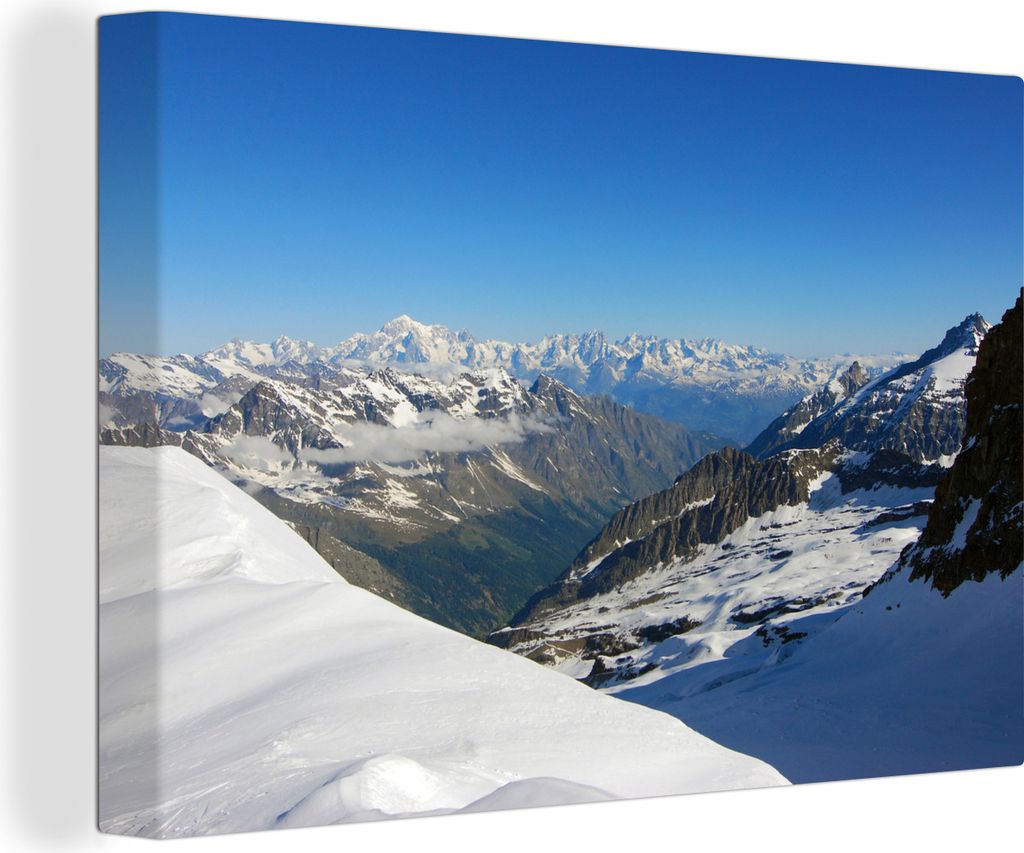OneMillionCanvasses - Leinwandbilder - 140x90 cm, Ein blauer Himmel über den schneebedeckten Berggipfeln im italienischen Nationalpark Gran Para...