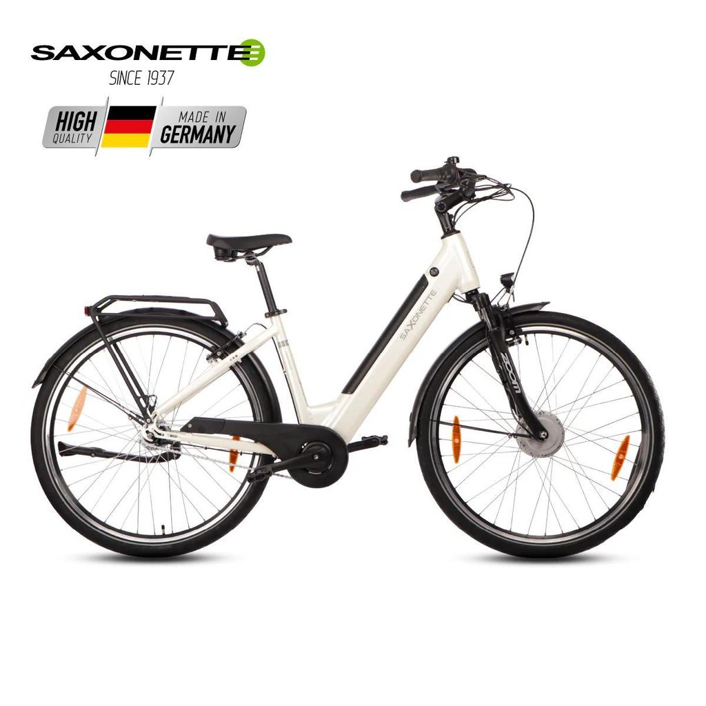 A white electric bicycle is shown against a white background. There are logos and text overlays on the top left of the image.