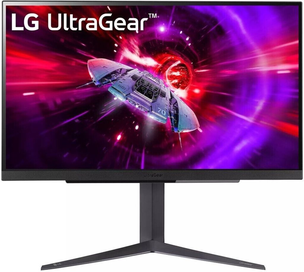 A gaming monitor displaying a spaceship in a colorful, abstract tunnel.