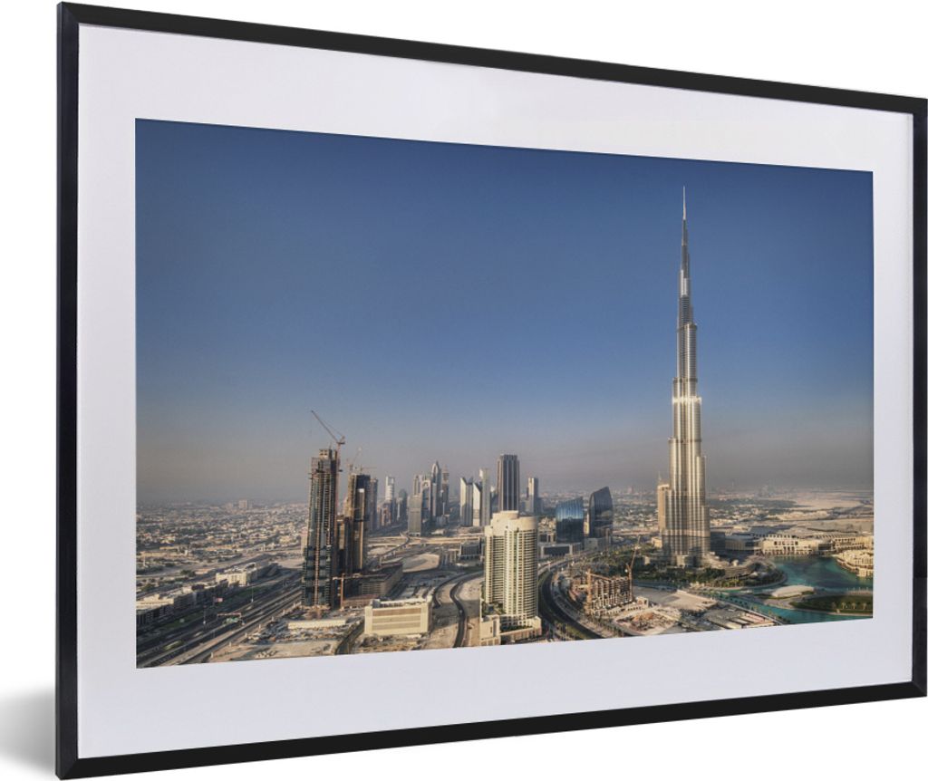 MuchoWow MuchoWow Gerahmtes Poster Blick auf den Himmel über Dubai mit dem markanten Burj Khalifa 60x40 cm - Poster mit zchwarzem Bilderrahmen...