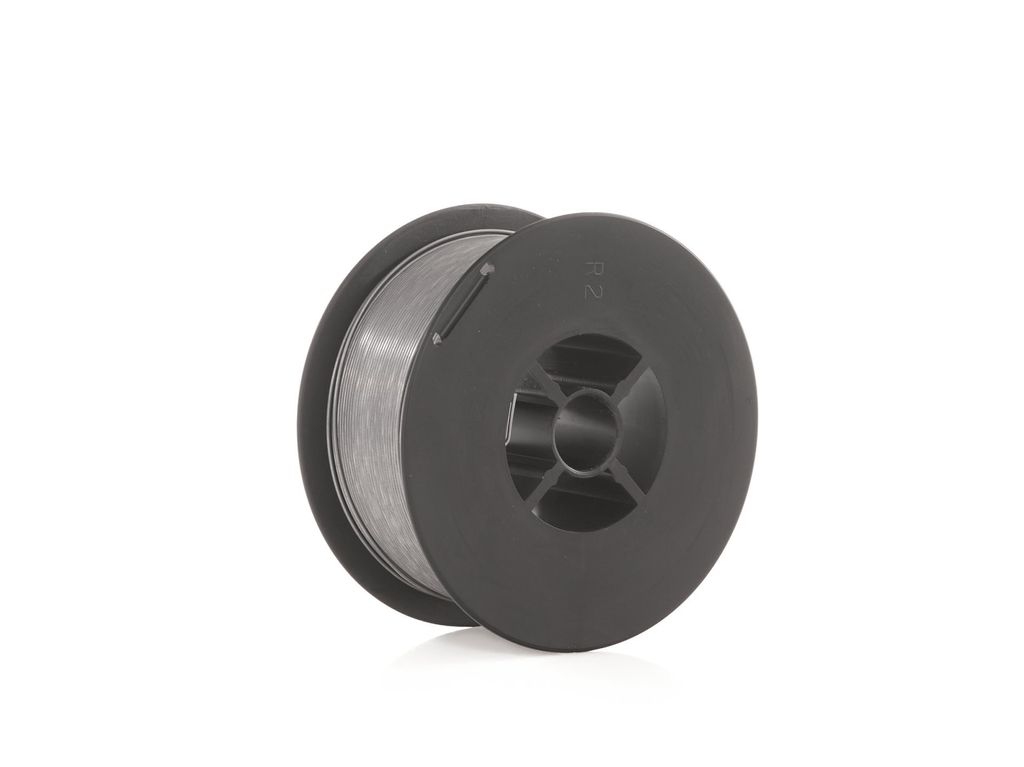 A spool of welding wire on a black plastic reel, isolated on a white background.