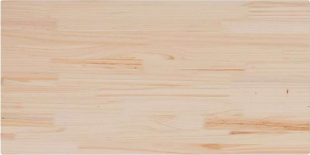 Close-up of a light-colored wooden tabletop.