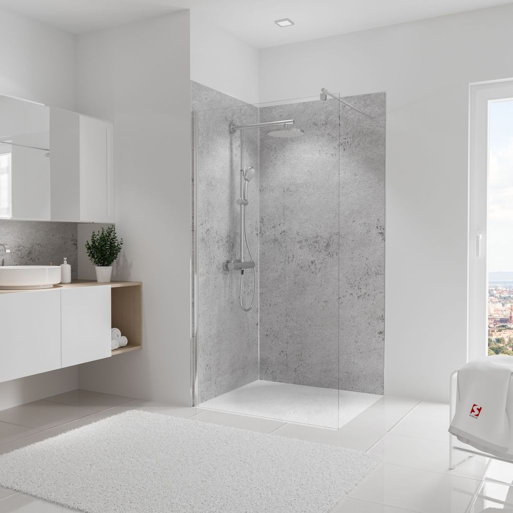 A modern bathroom with a walk-in shower and vanity.