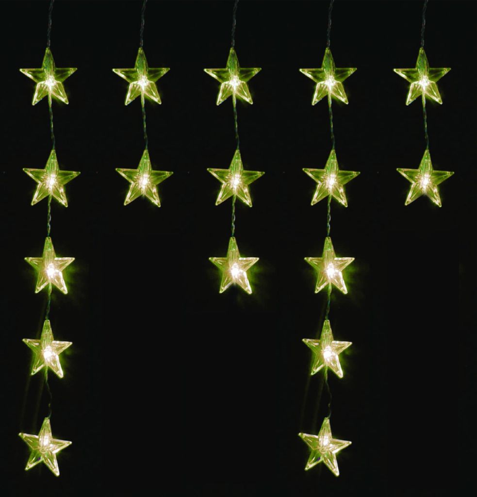 A string of star-shaped lights against a black background.